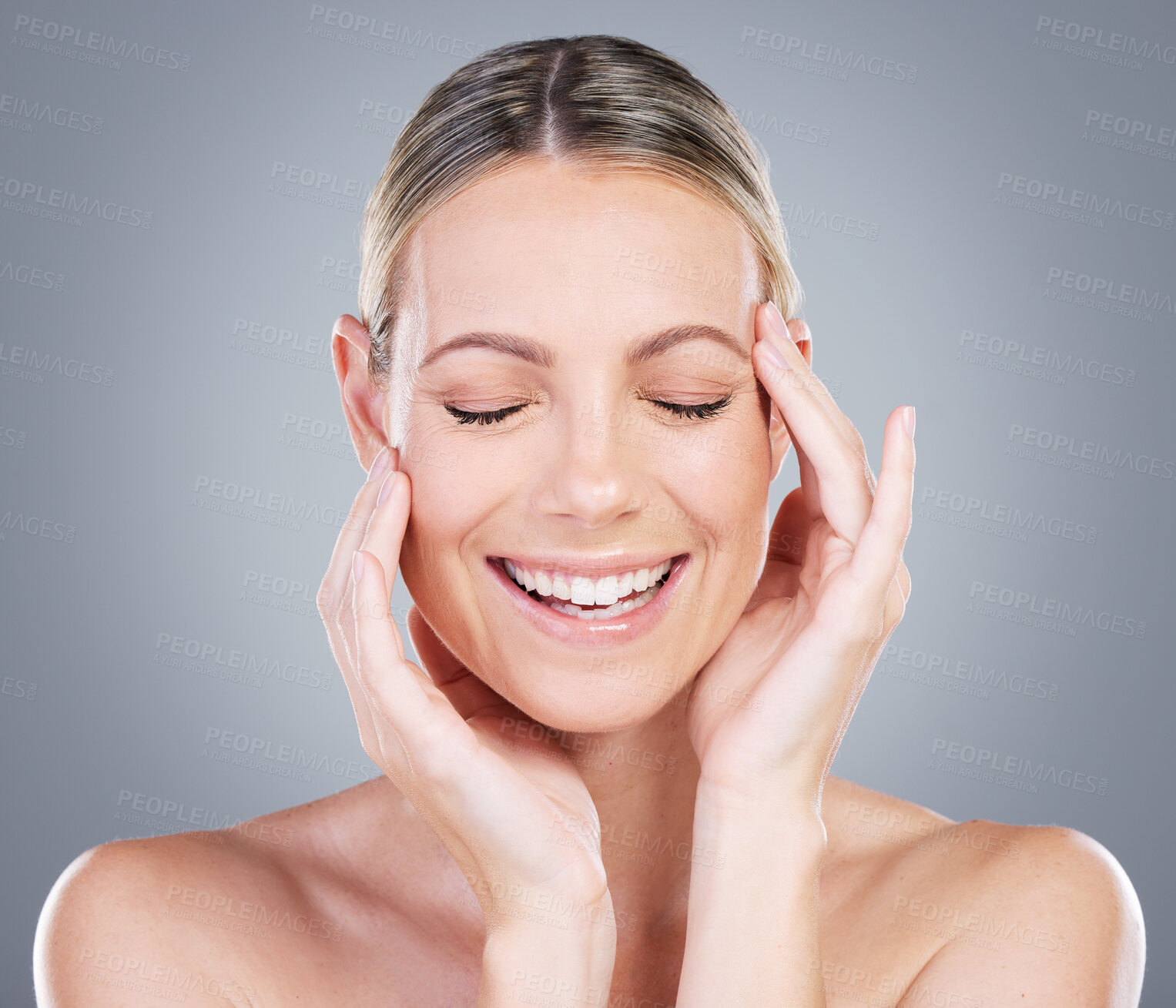 Buy stock photo Studio, face and girl with smooth for skincare, wellness and health of tone glow for anti aging. Woman model, results and treatment of beauty for cosmetics, smile and self care by gray background