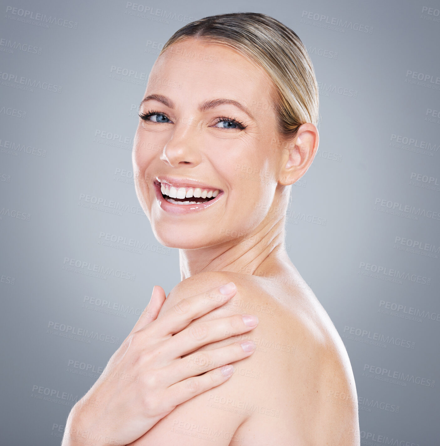 Buy stock photo Studio, shoulder and girl in portrait for skincare, wellness and health of tone glow for anti aging. Woman model, results and treatment of beauty for cosmetics, smile and self care by gray background