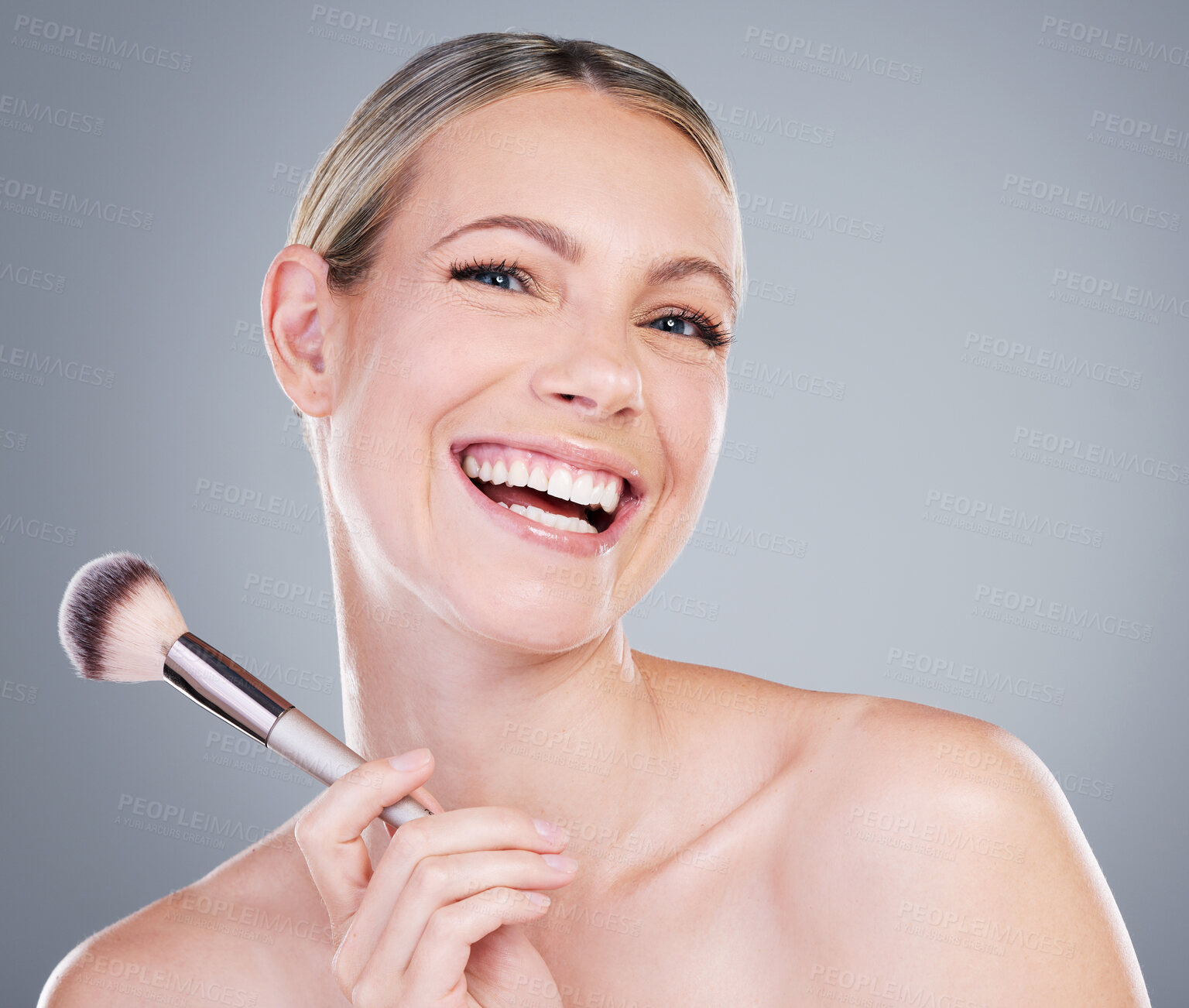 Buy stock photo Makeup brush, smile and portrait of woman in studio with self care routine for clear skin. Cosmetic, makeover and female person with beauty tool for face cosmetology treatment by gray background.