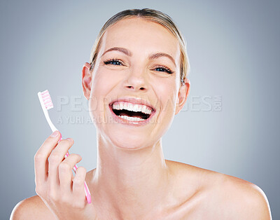 Buy stock photo Happy woman, portrait and toothbrush for dental care in studio, cosmetics and hygiene on gray background. Female person, health and teeth for oral treatment, confidence and orthodontics healthcare