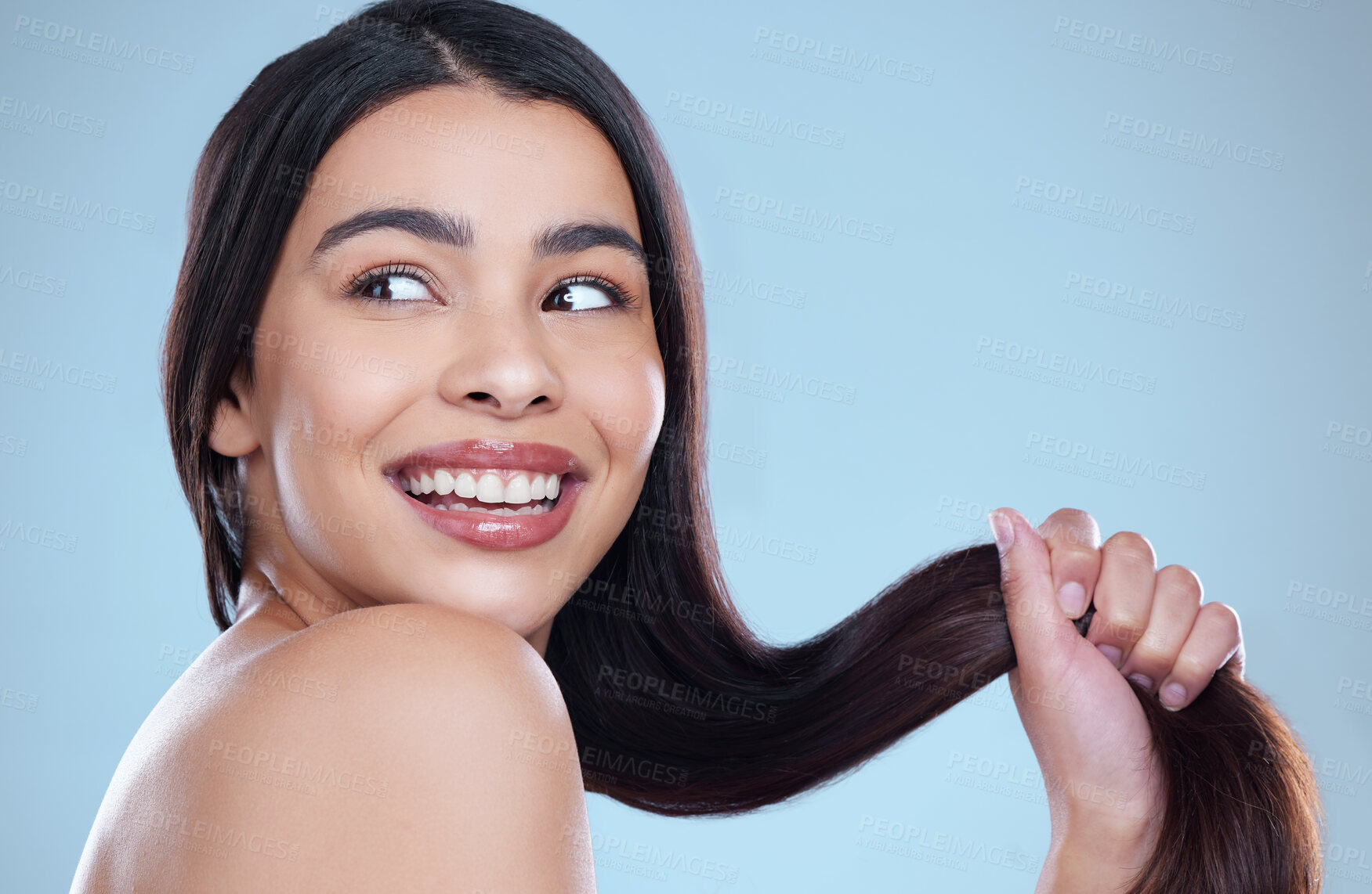 Buy stock photo Hair care, woman or cosmetics with dermatology, thinking or texture on blue studio background. Person, glow or model with beauty, volume or grooming routine with aesthetic, growth or shine with smile