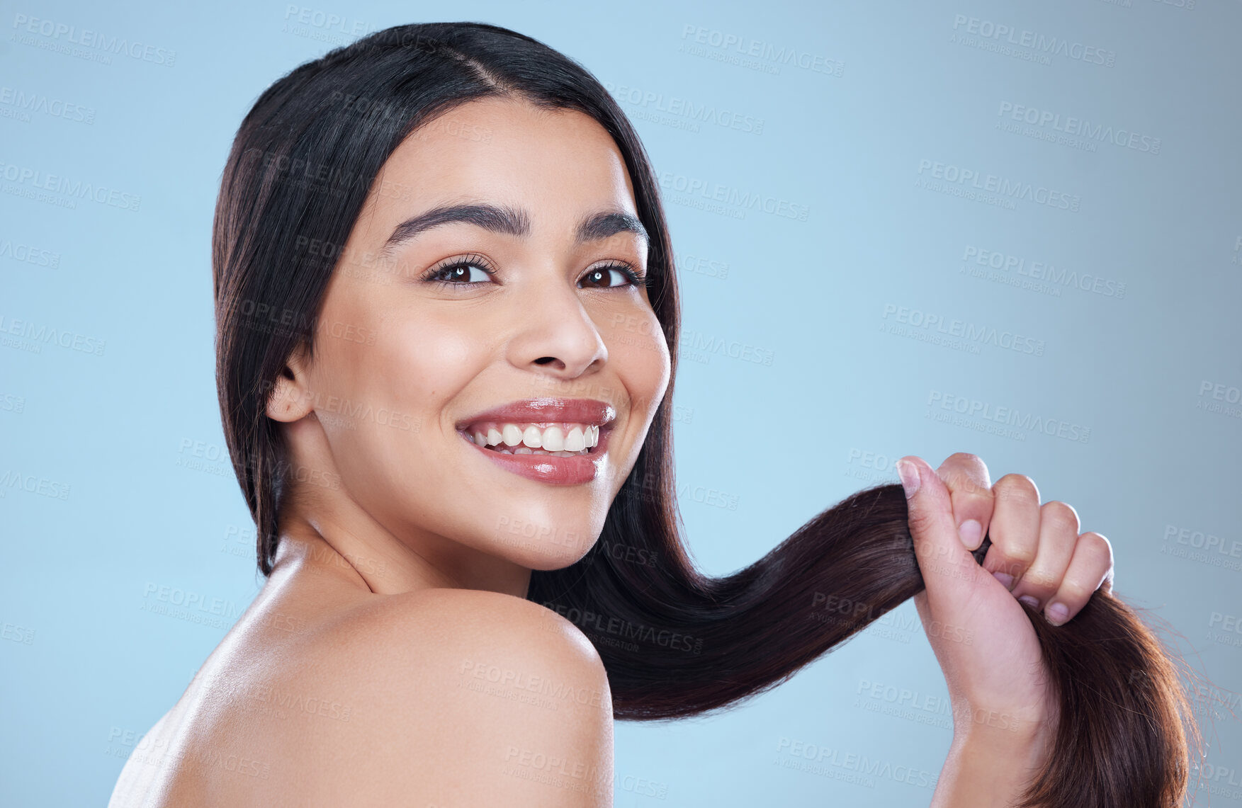 Buy stock photo Hair care, woman or beauty with dermatology, portrait or texture on blue studio background. Person, face or model with smile, volume or grooming routine with aesthetic, growth or shine with cosmetics