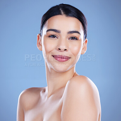 Buy stock photo Woman, happy and portrait in studio for skincare, cosmetics and confidence in beauty. Female person, dermatology and smile on blue background for transformation, aesthetic and spa treatment for glow