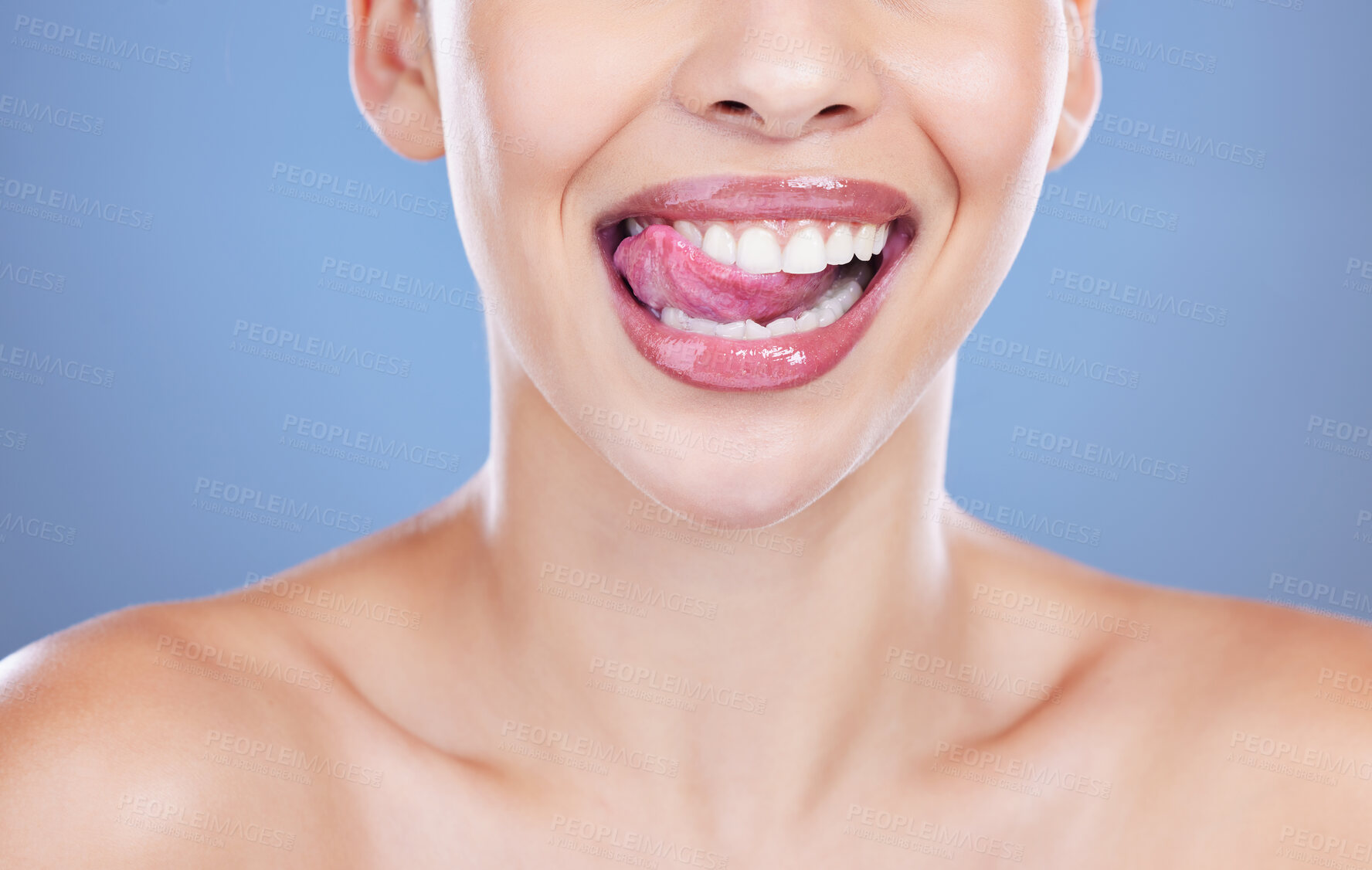 Buy stock photo Oral, results and woman with mouth in studio for dental hygiene, healthcare and gum wellness. Happy, client and lips with tongue out for teeth whitening, treatment and cosmetics on blue background