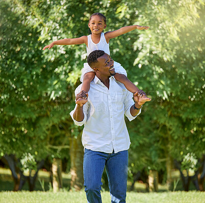 Buy stock photo Shot of a man and his daughter spending the day outdoors