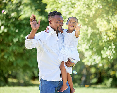 Buy stock photo Shot of a man and his daughter spending the day outdoors