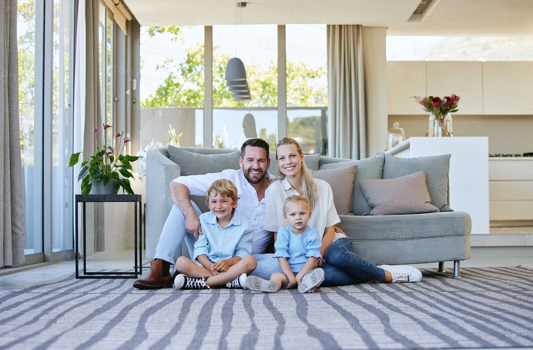 Buy stock photo Portrait, family and smile of children on floor for love, care or bonding together with parents in home. Dad, mom and happy kids in living room for relax, connection or support with siblings in house