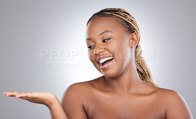 Buy stock photo Black woman, open hand and skincare in studio with space for mockup with smile by white background. Girl, model or person with palm for beauty, cosmetics and natural glow with facial transformation