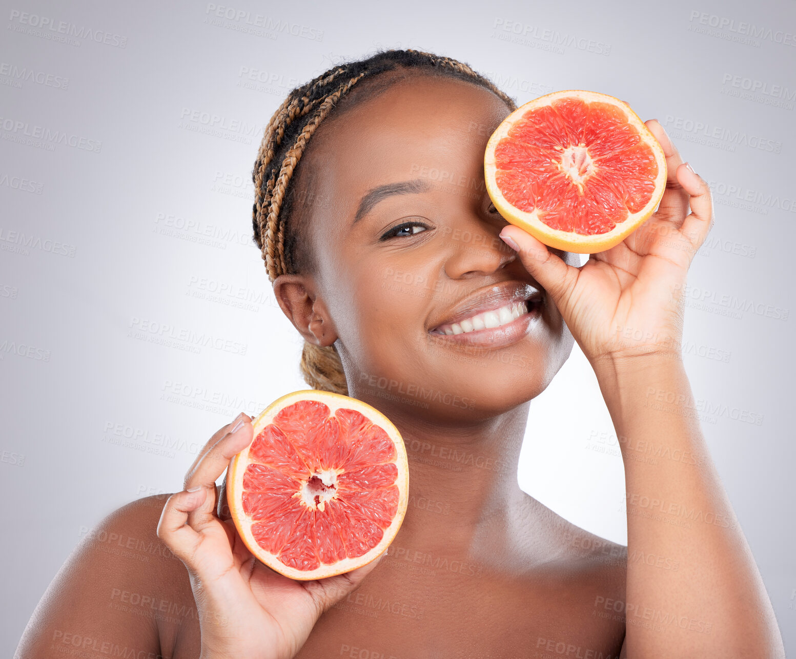 Buy stock photo Beauty, grapefruit and portrait of black woman in studio for natural, cosmetics and vitamin c. Nutrition, diet and detox with female model on grey background for citrus fruit and health product