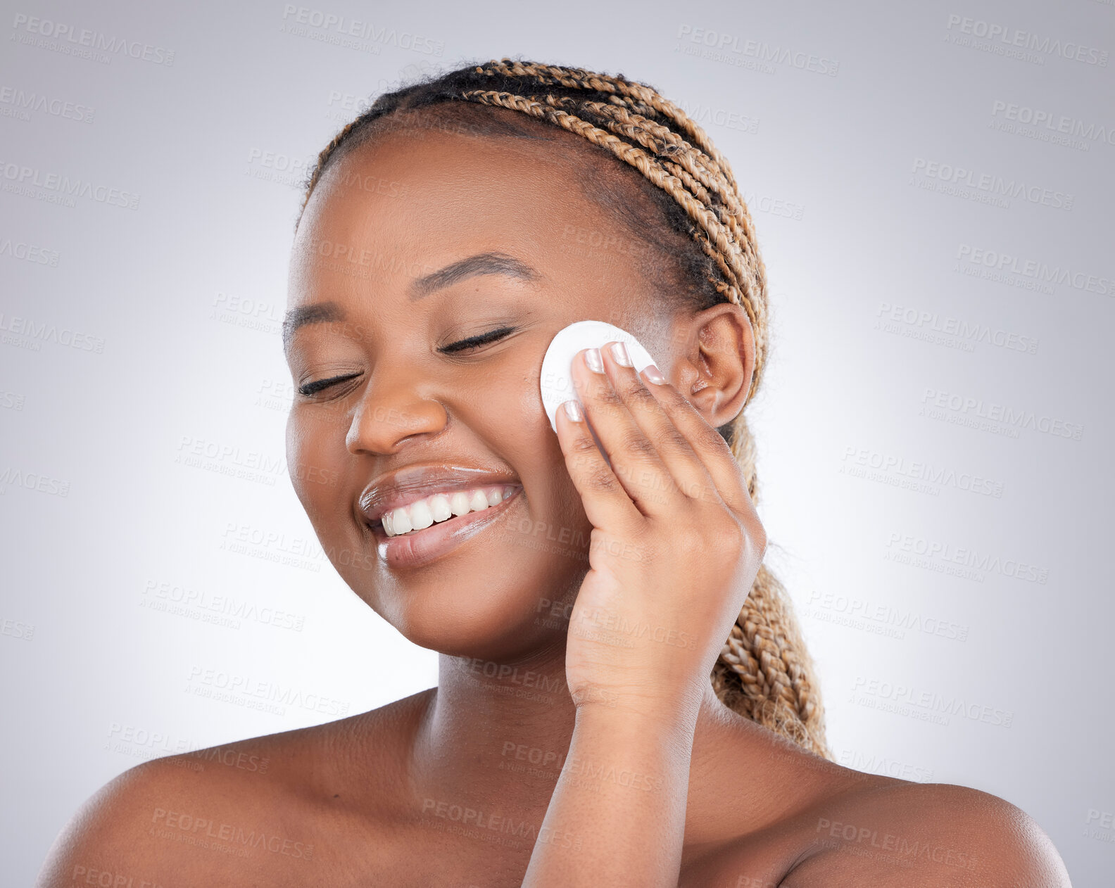 Buy stock photo Smile, studio and black woman with cleaning pad for natural beauty, healthy skin and luxury cosmetics. Dermatology, skincare and girl with cotton wipe, facial care and happy face on white background.