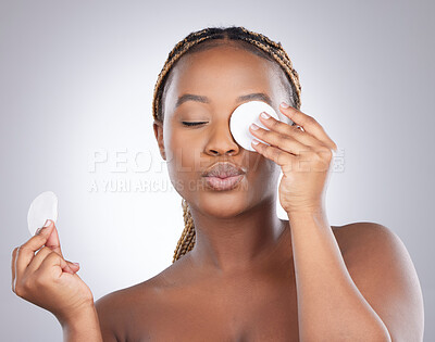 Buy stock photo Kiss, studio and black woman with cotton pad for natural beauty, healthy skin and luxury cosmetics for face. Dermatology, skincare and girl with cleaning wipe, facial care or love on white background