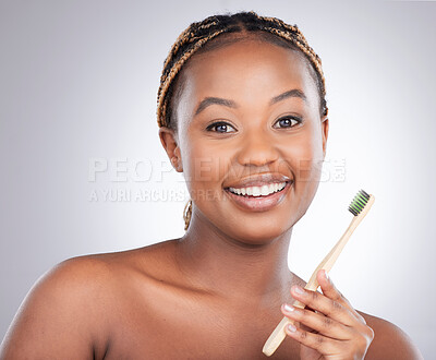 Buy stock photo African woman, wood toothbrush and studio portrait with smile for oral wellness by white background. Girl, model and person with bamboo dental product for sustainability, health and clean mouth