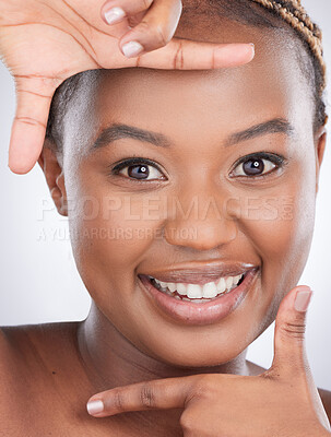 Buy stock photo Beauty, frame and portrait of black woman in studio for cosmetics, wellness and skincare. Dermatology, spa aesthetic and person with hands for natural skin, salon and facial on white background