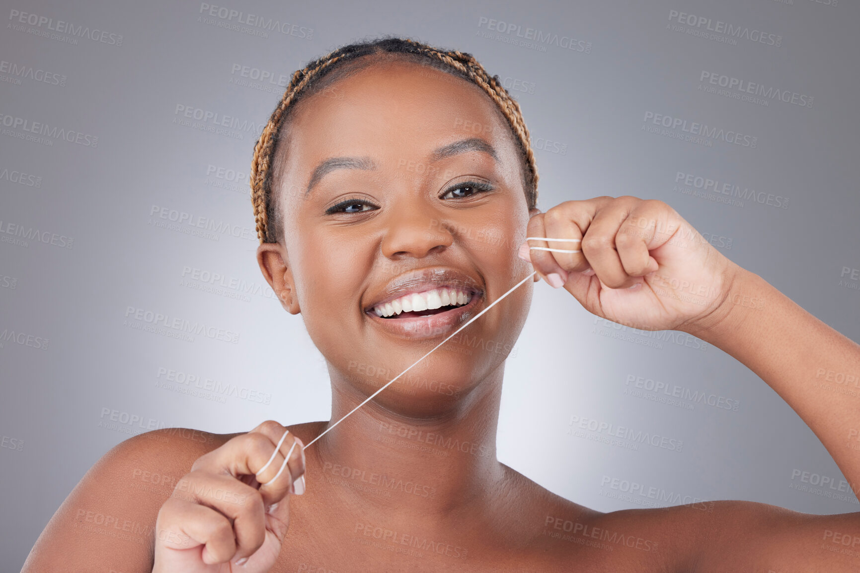 Buy stock photo Studio, cleaning and portrait of woman with floss for bacteria, oral hygiene and dental care. Gray background, health and person for whitening, wellness and grooming for gum disease and fresh breath