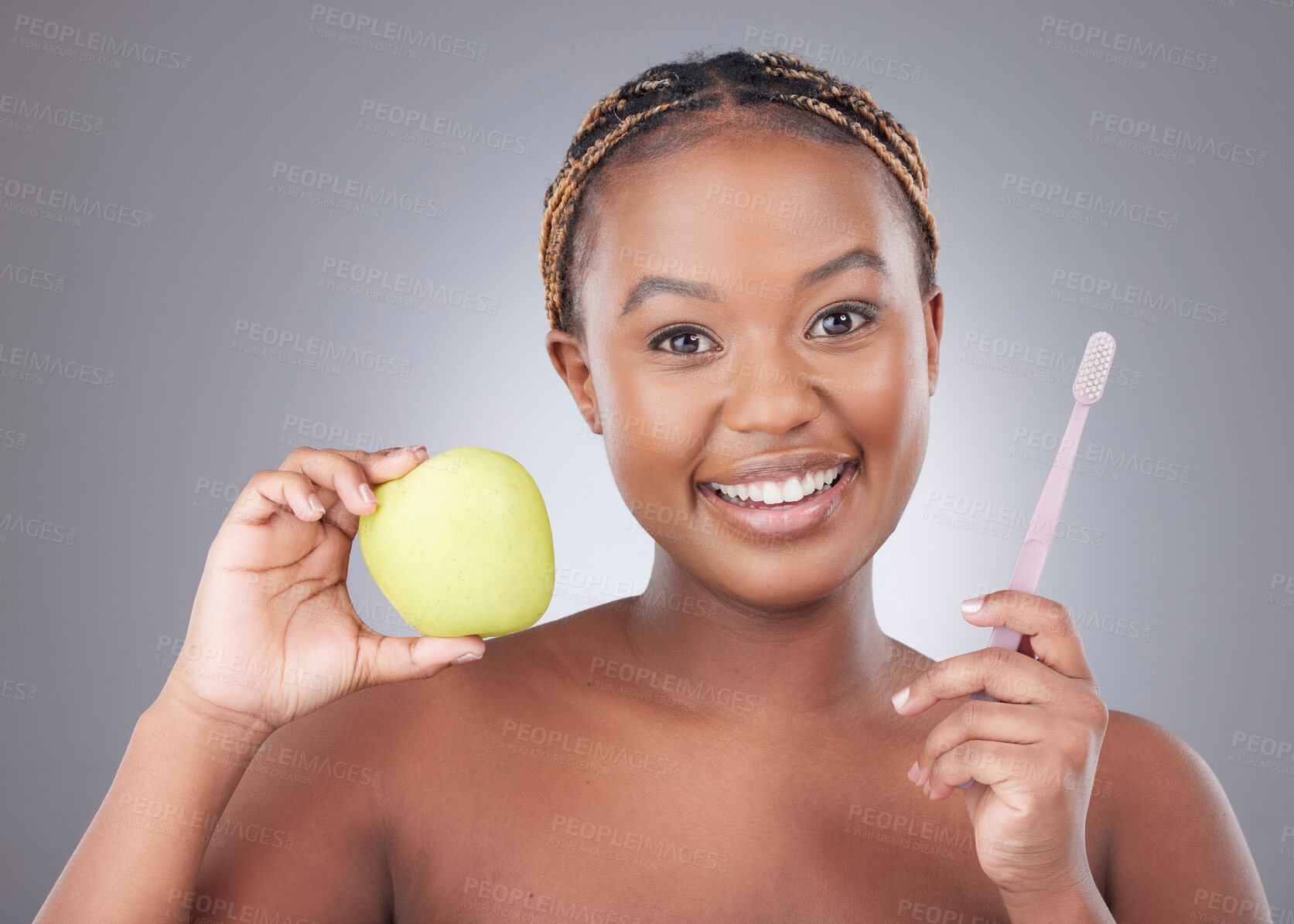 Buy stock photo Black woman, apple and toothbrush in studio portrait, smile and dental wellness by white background. Model, African person and fruit for benefits with health and teeth whitening for transformation