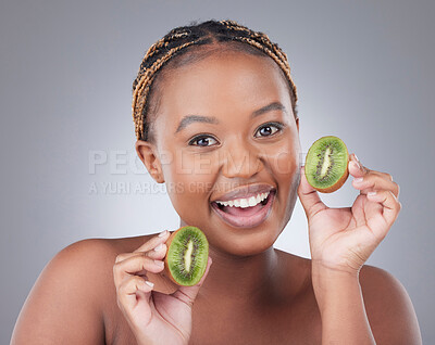 Buy stock photo Black woman, kiwi and portrait for health in studio with diet, nutrition and detox for skincare by white background. Model, person and girl with fruit for vitamin, benefits and vegan to lose weight