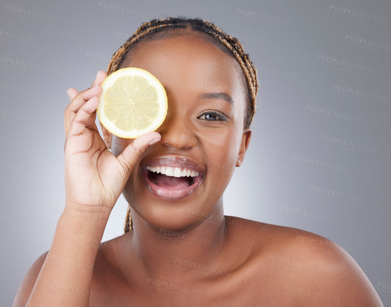 Buy stock photo Beauty, lemon and smile with portrait of with black woman in studio for natural, cosmetics and vitamin c. Nutrition, diet and detox with model on grey background for citrus fruit and health product