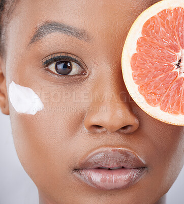 Buy stock photo Face cream, skincare and portrait of black woman with grapefruit for beauty, cosmetics and facial. Dermatology, fruit and girl with lotion for vitamins, wellness and nutrition on studio background