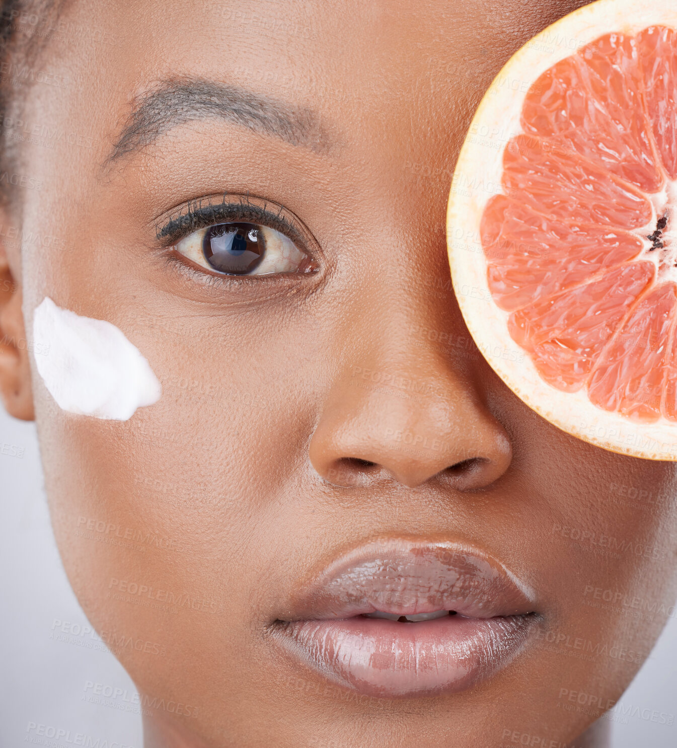 Buy stock photo Face cream, skincare and portrait of black woman with grapefruit for beauty, cosmetics and facial. Dermatology, fruit and girl with lotion for vitamins, wellness and nutrition on studio background