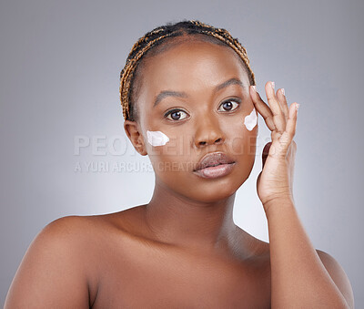 Buy stock photo Face cream, skincare and portrait of black woman in studio for beauty, wellness and facial care on white background. Dermatology, salon and person with moisturizer, lotion and anti aging cosmetics