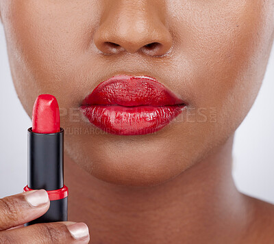 Buy stock photo Beauty, lipstick and lips of woman in studio for cosmetics products, makeup and skincare. Cosmetology, aesthetic and closeup of mouth of person with lipgloss, shine and red color on white background