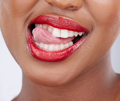 Buy stock photo Cosmetics, lipstick and tongue of woman in studio for beauty products, makeup and skincare. Cosmetology, smile and closeup of mouth of person with lipgloss, shine and red color on white background