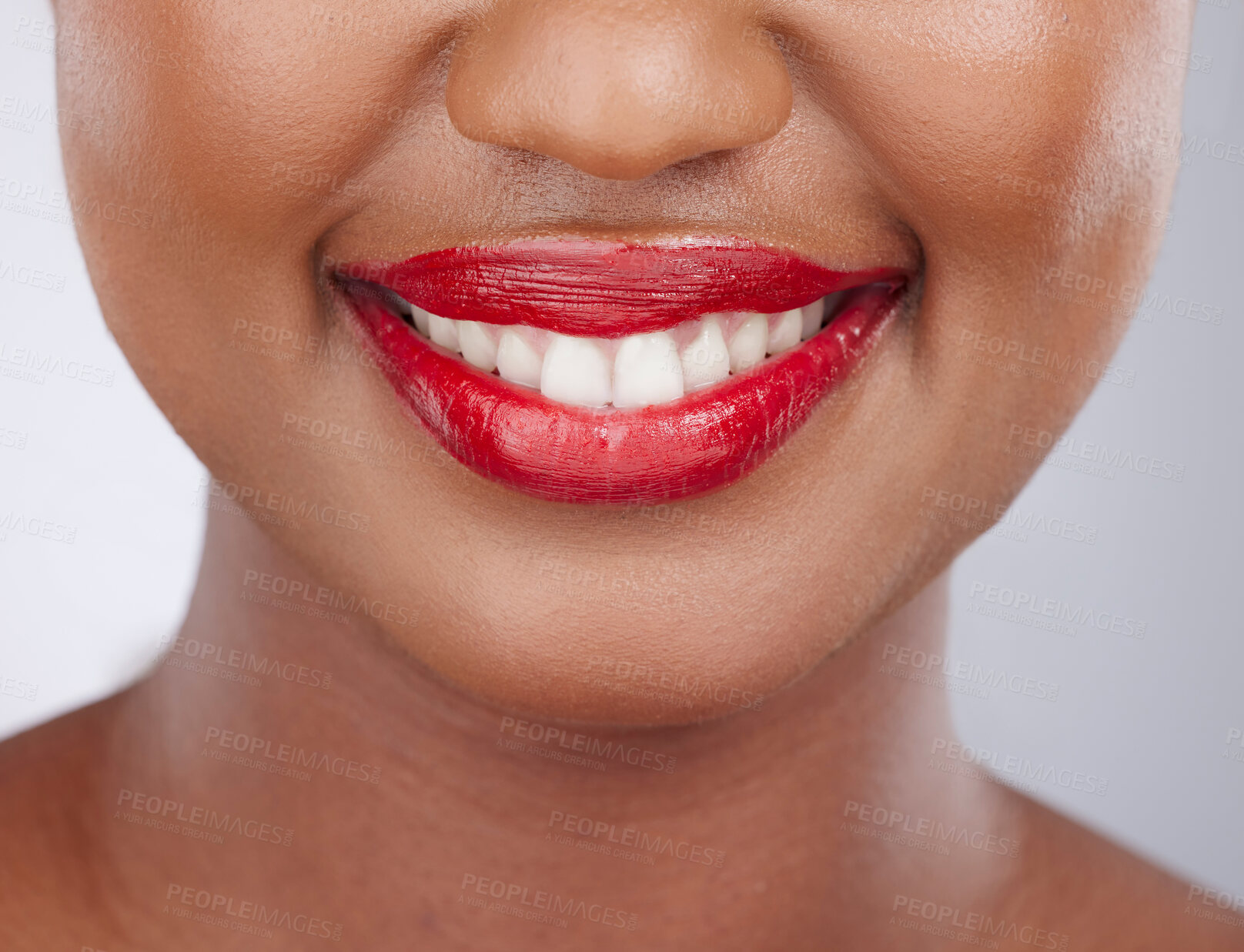 Buy stock photo Beauty, smile and lips of woman in studio for cosmetics products, makeup and skincare. Cosmetology, aesthetic and closeup of mouth of person with lipgloss, shine and red color on white background