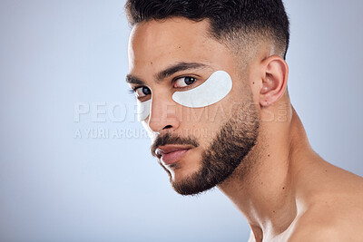 Buy stock photo Beauty, portrait and man with eye pads for skincare and results for healthy glow in studio. Male person, eyes and patch for dark circles with wrinkles prevention and spa aesthetic by gray background