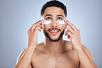 Treating his undereye skin with care