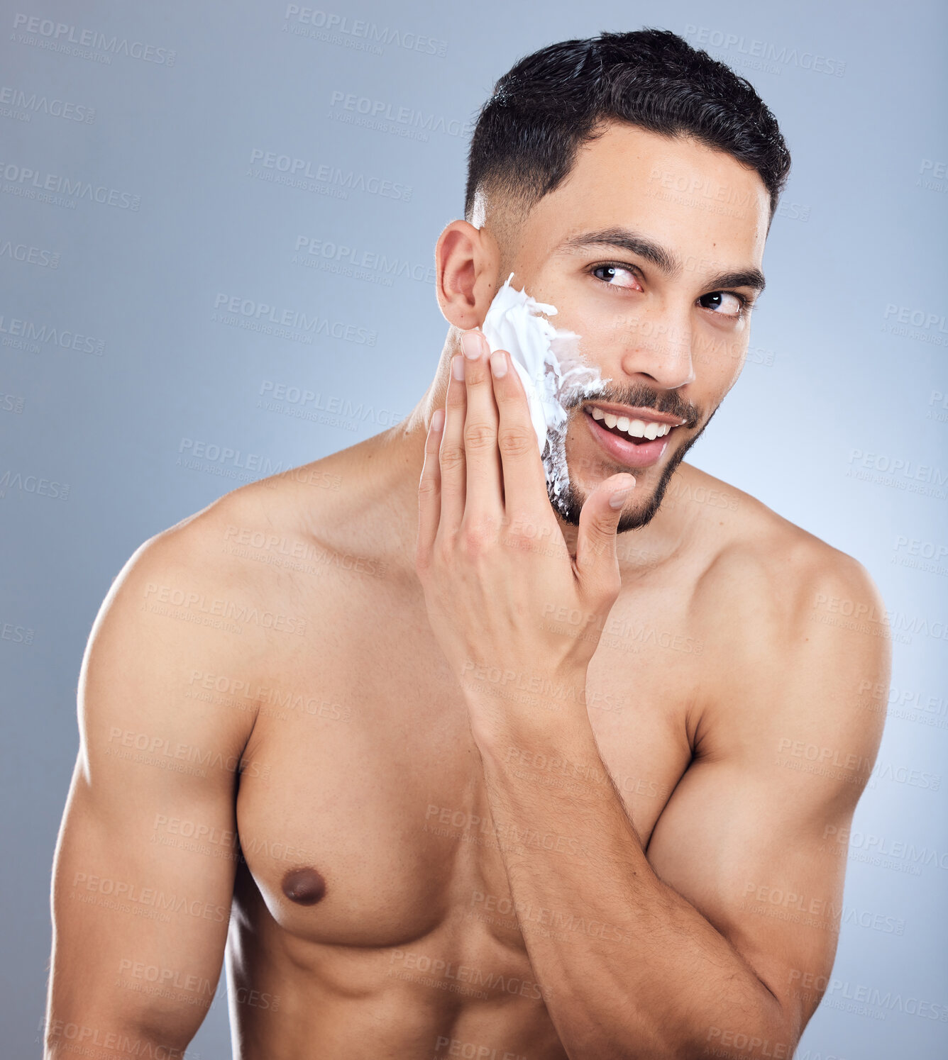 Buy stock photo Man, happy and face with shaving foam for hair removal with body, self care and facial change in studio. Isolated guy, model and skincare cream product for beard growth maintenance by gray background