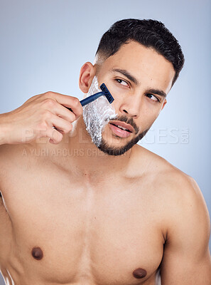 Buy stock photo Man, razor and shaving cream in studio with thinking for hygiene, body and skincare ideas. Male person, thoughts and foam on face with blade for beard maintenance and hair removal by grey background