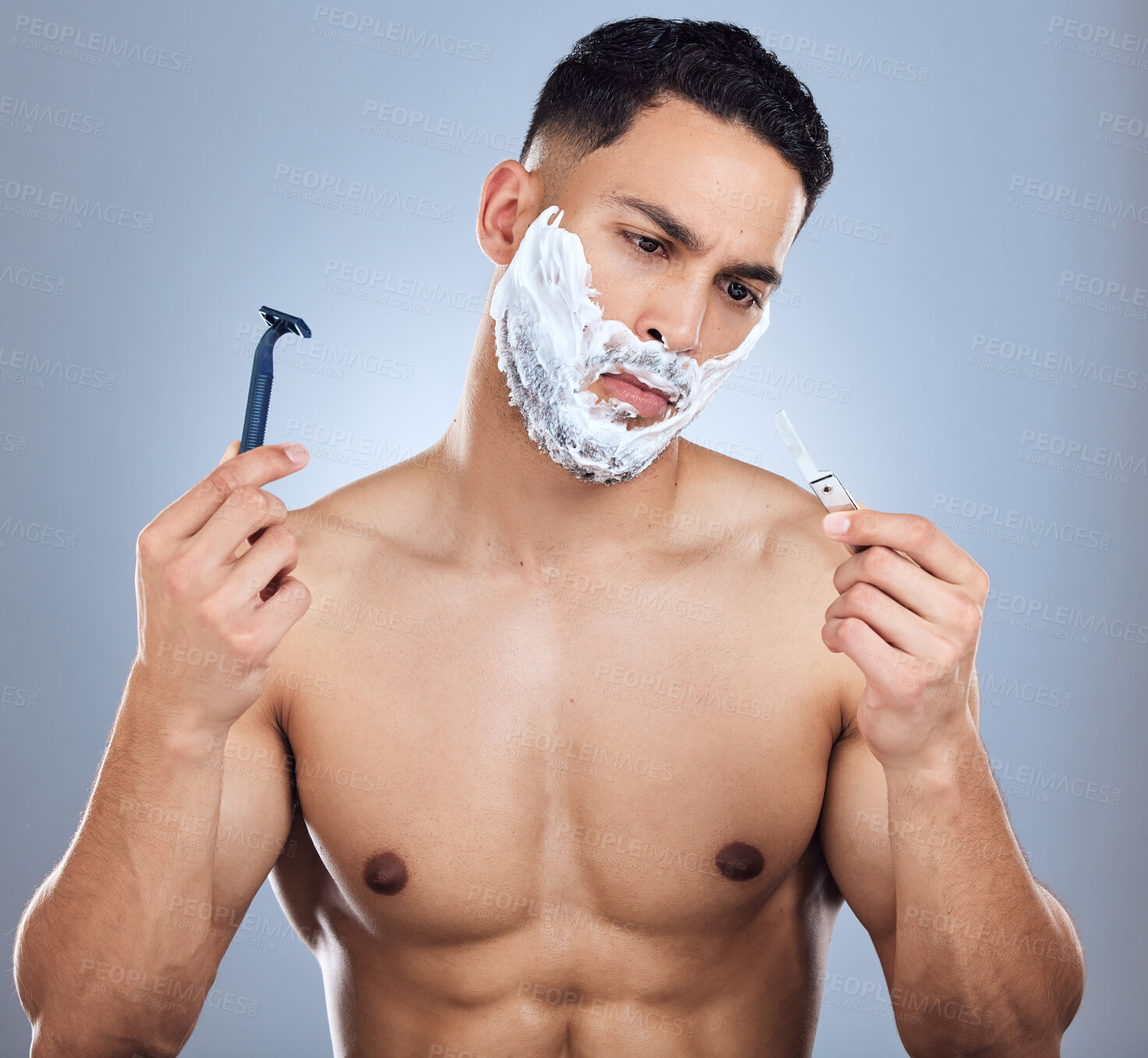 Buy stock photo Man, shaving and choice for razor in studio with skincare and confused for face transformation tools. Male person, doubt and decision for blade product with hair removal and beard by gray background