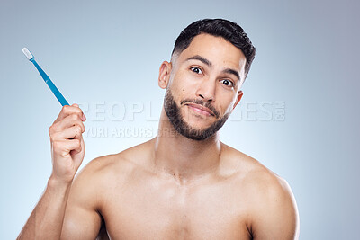 Buy stock photo Man, portrait and happy with toothbrush in studio for oral hygiene, mouth cleaning and morning routine. Dental, person and brushing teeth for fresh breath, plaque or healthy gums on gray background