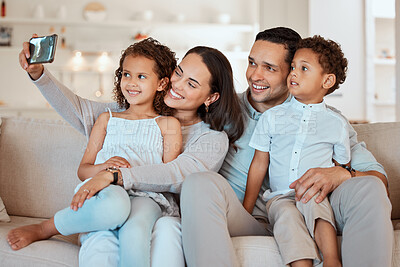 Buy stock photo Parents, happy family and selfie of kids on sofa for care, love or bonding together. Picture, mother and father with children in home living room for social media photo, memory or relax with siblings