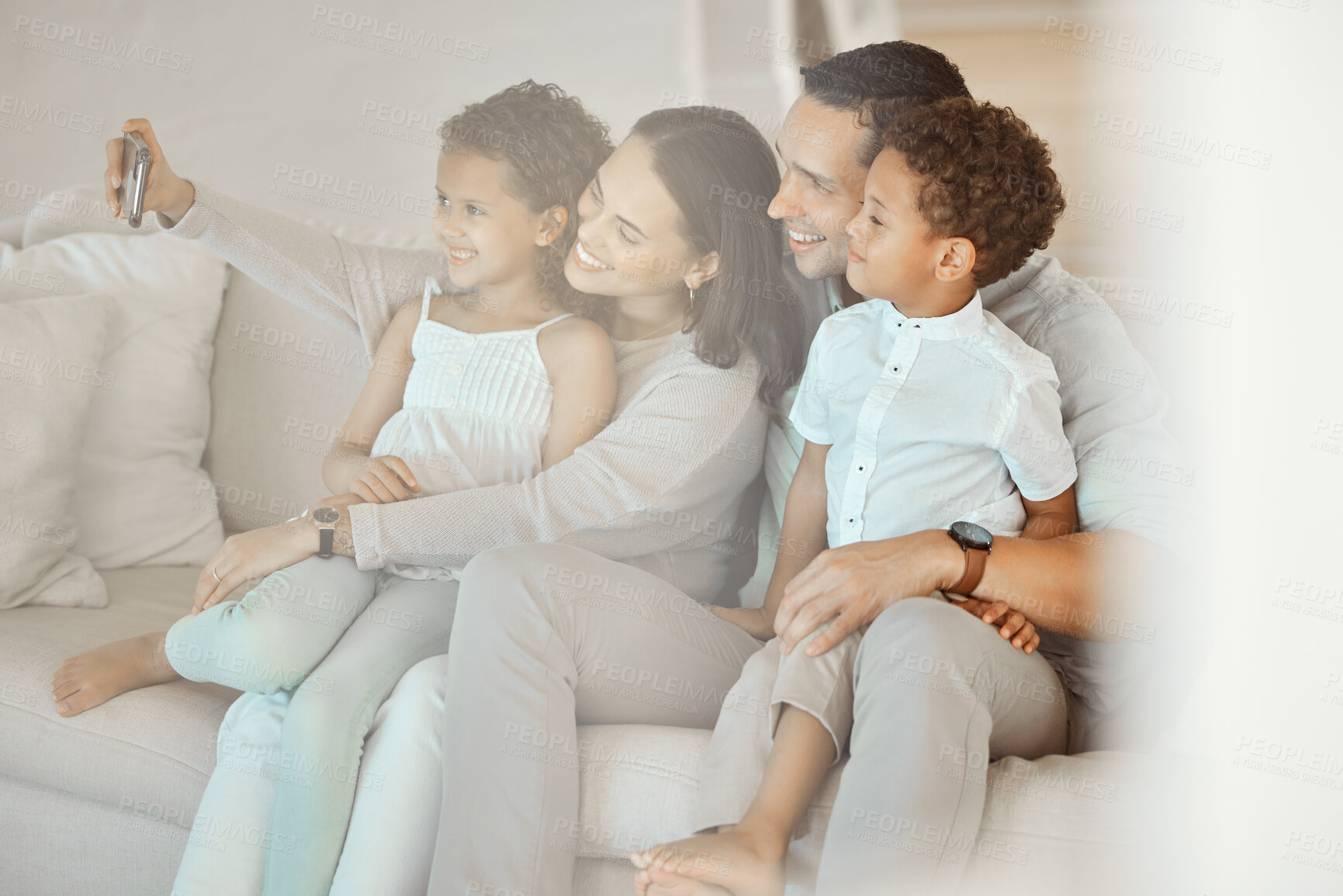 Buy stock photo Children, happy family and selfie of parents in living room for care, love or bonding together. Picture, mother and father with kids in home on sofa for social media, memory and relax with siblings