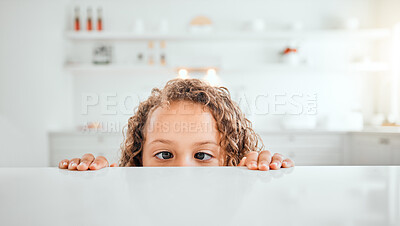 Buy stock photo Shot of a little girl looking to see what's on a table at home
