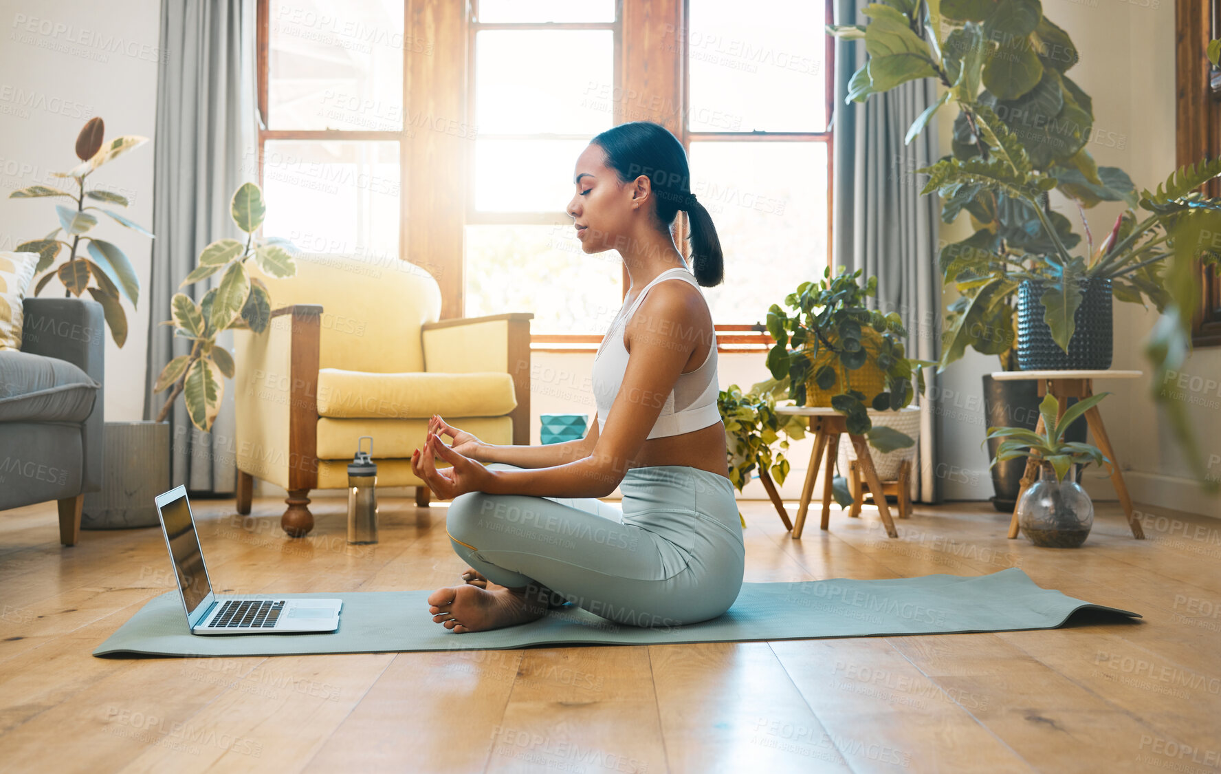 Buy stock photo Yoga, fitness meditation and woman on laptop for online class and workout with home, holistic health and wellness. Biracial person in lotus pose, meditate and training tutorial, streaming on computer