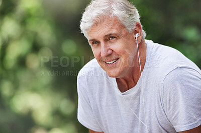 Buy stock photo Senior man, exercise and outdoor with music earphones for run, workout and training for fitness. Elderly male happy on break, rest and tired thinking of cardio audio for health and wellness in nature