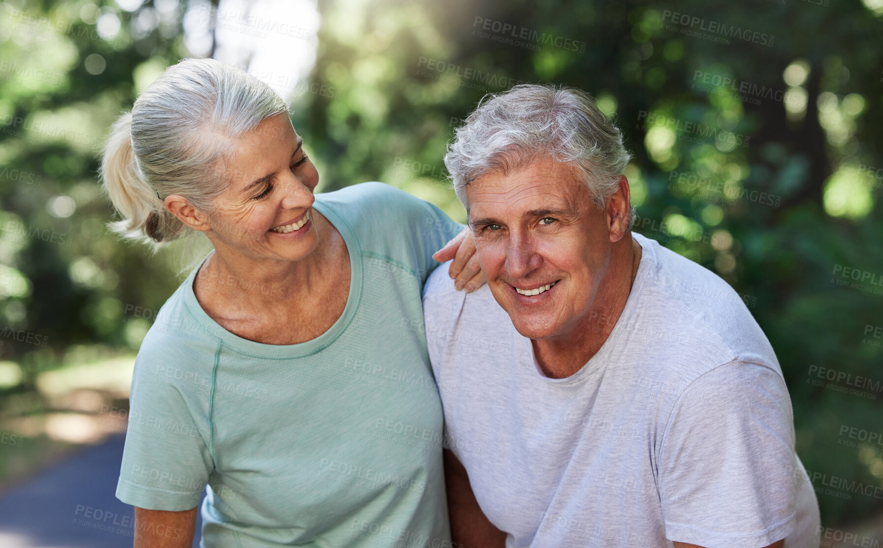 Buy stock photo Senior couple, exercise and happy outdoor for a run, workout and training on road for fitness. Elderly man and woman laugh and tired together for cardio health and wellness while running in nature