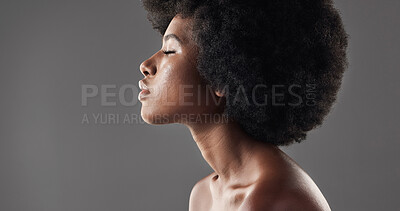 Buy stock photo Hair care, mockup and profile of black woman with afro hairstyle, beauty and skincare on grey background. Natural haircare, cosmetics and face of African model with skin glow or shine in studio space