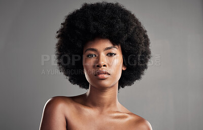 Buy stock photo Portrait, cosmetics and black girl with confidence for dermatology in studio background. African, woman and beauty with glowing skin with makeup and afro for facial treatment for self care or shine.