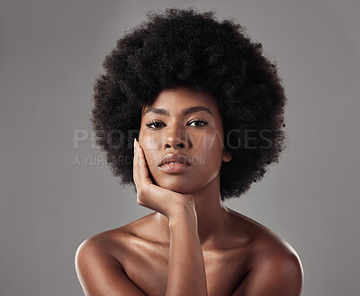 Buy stock photo Skincare, black girl and makeup with confidence in portrait for wellness in studio background with afro. Beauty, face and glowing skin with african woman with cosmetics for dermatology with makeup.