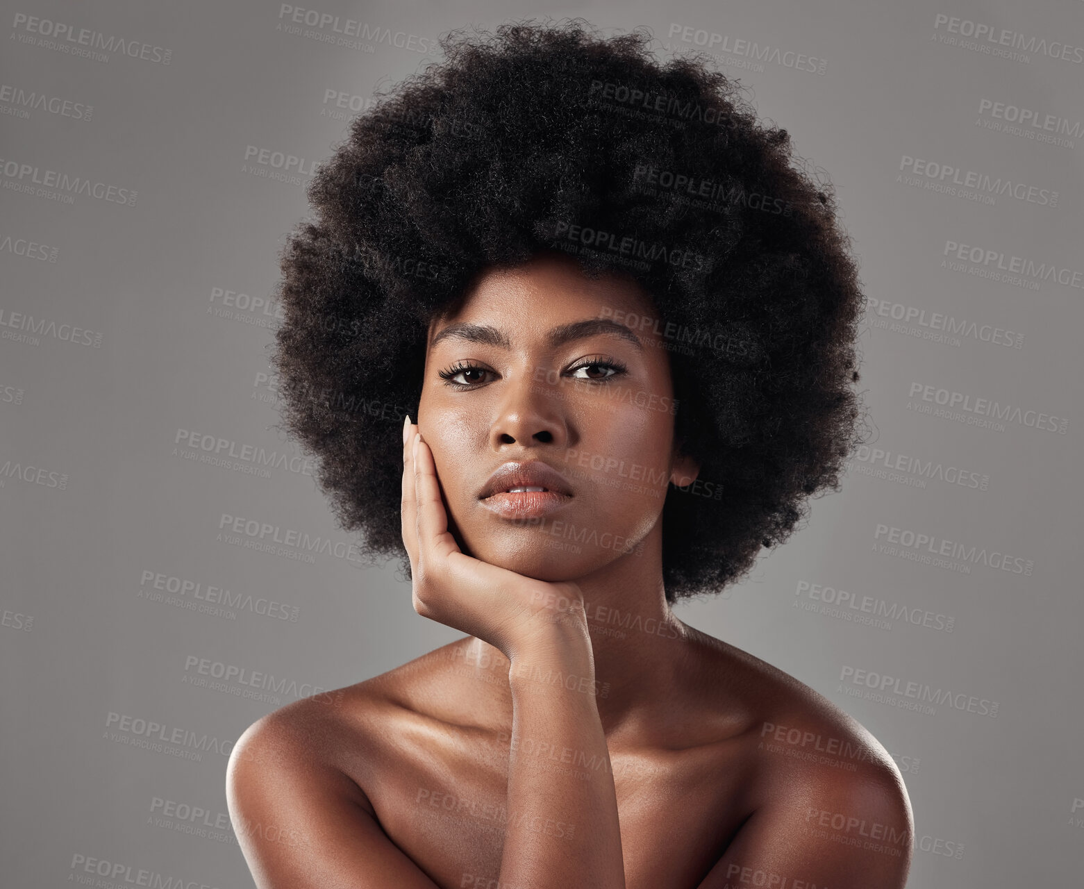 Buy stock photo Skincare, black girl and makeup with confidence in portrait for wellness in studio background with afro. Beauty, face and glowing skin with african woman with cosmetics for dermatology with makeup.