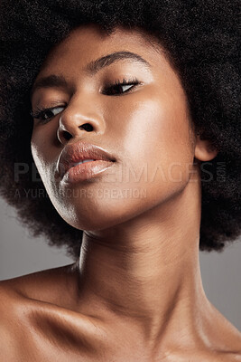 Buy stock photo Face, black woman and natural beauty in studio, background or dermatology. African female model thinking of aesthetic shine, skincare treatment and facial glow for afro hair, self care or cosmetology
