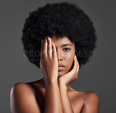 Buy stock photo Face, skincare and black woman cover with hand in studio isolated on a gray background. Natural cosmetics, serious portrait and African model with aesthetic, beauty and healthy skin in spa treatment.