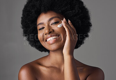 Buy stock photo African woman, skincare cream or studio portrait with afro, face or cosmetic for smile by background. Girl, model and happy for natural self care with makeup, clean aesthetic and product for beauty