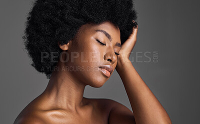 Buy stock photo Natural beauty, hair care and black woman with skincare, dermatology and confident girl on a grey studio background. Female person, luxury or model with makeup, cosmetics and aesthetics with grooming