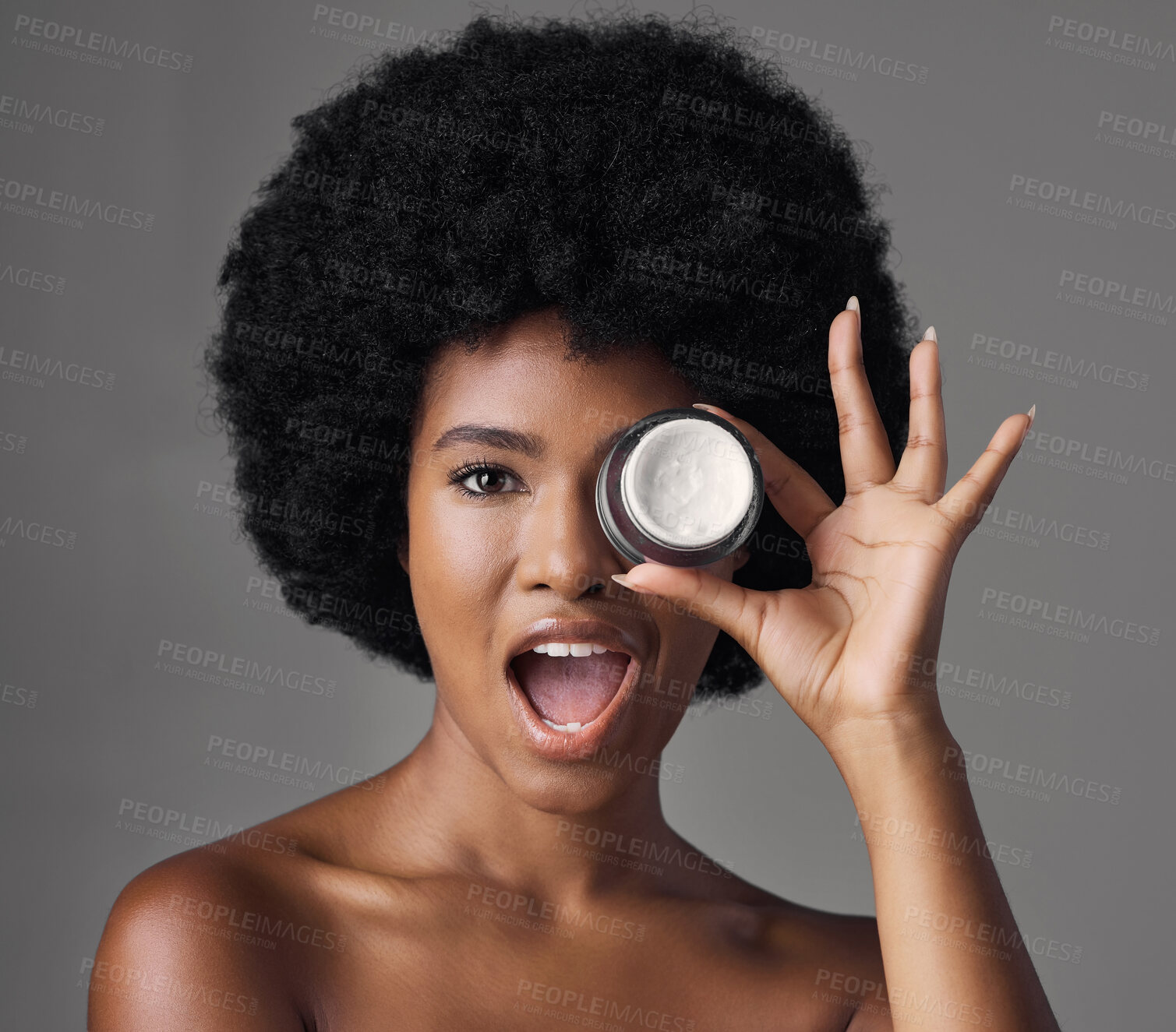 Buy stock photo Black woman, cream and beauty with cosmetics product, skincare and dermatology in portrait on studio background. Natural, afro hairstyle and African female model, lotion and facial moisturizer
