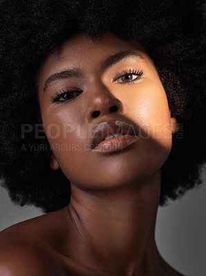 Buy stock photo Dark portrait light, makeup or black woman with beauty foundation, natural facial cosmetics and spa skincare shine. Studio lighting, face shadow or African person with glowing skin on grey background