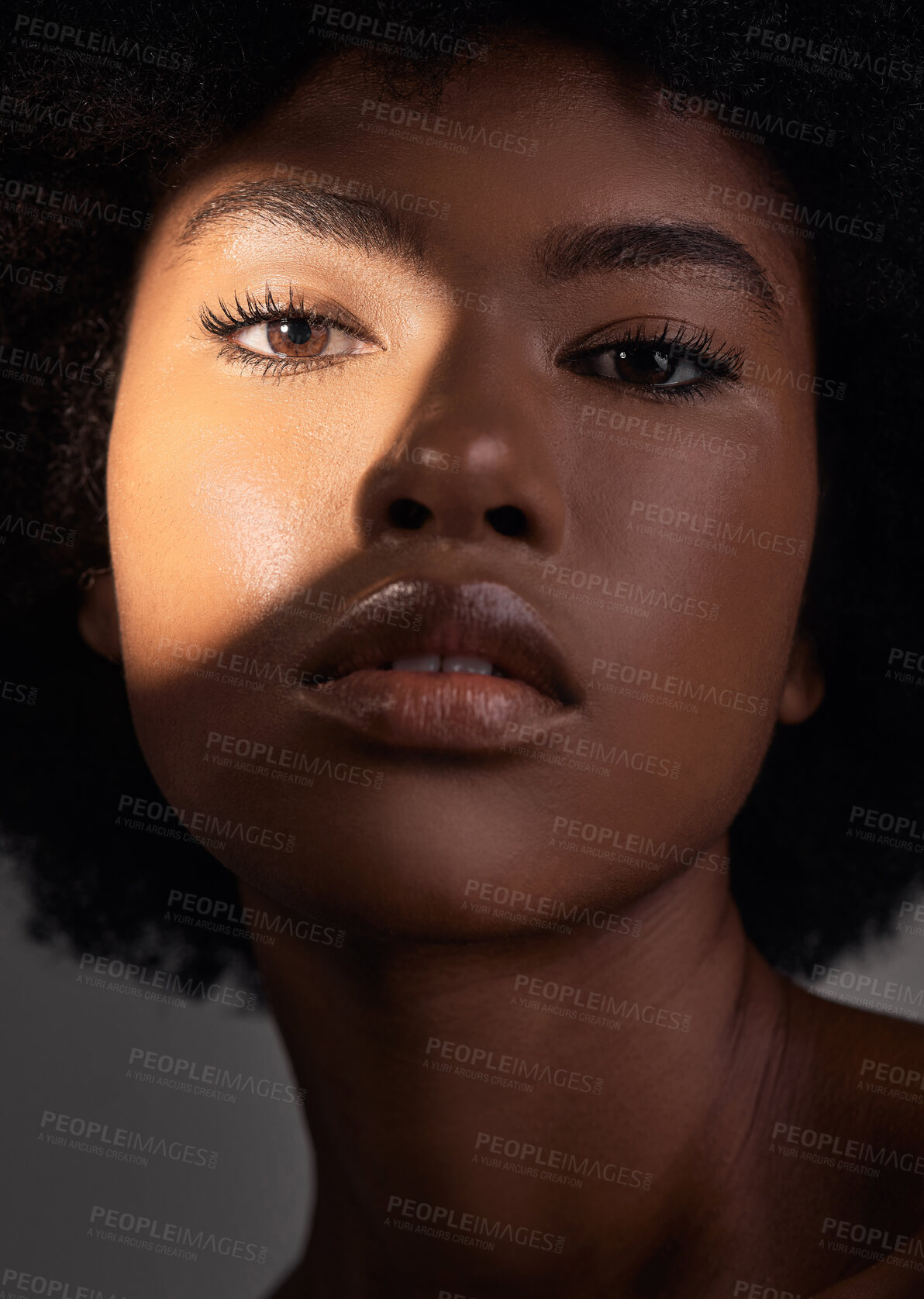 Buy stock photo Shadow, portrait and black woman with beauty light, natural facial makeup and aesthetic skincare shine. Creative studio lighting, cosmetology and African person face with self care on grey background